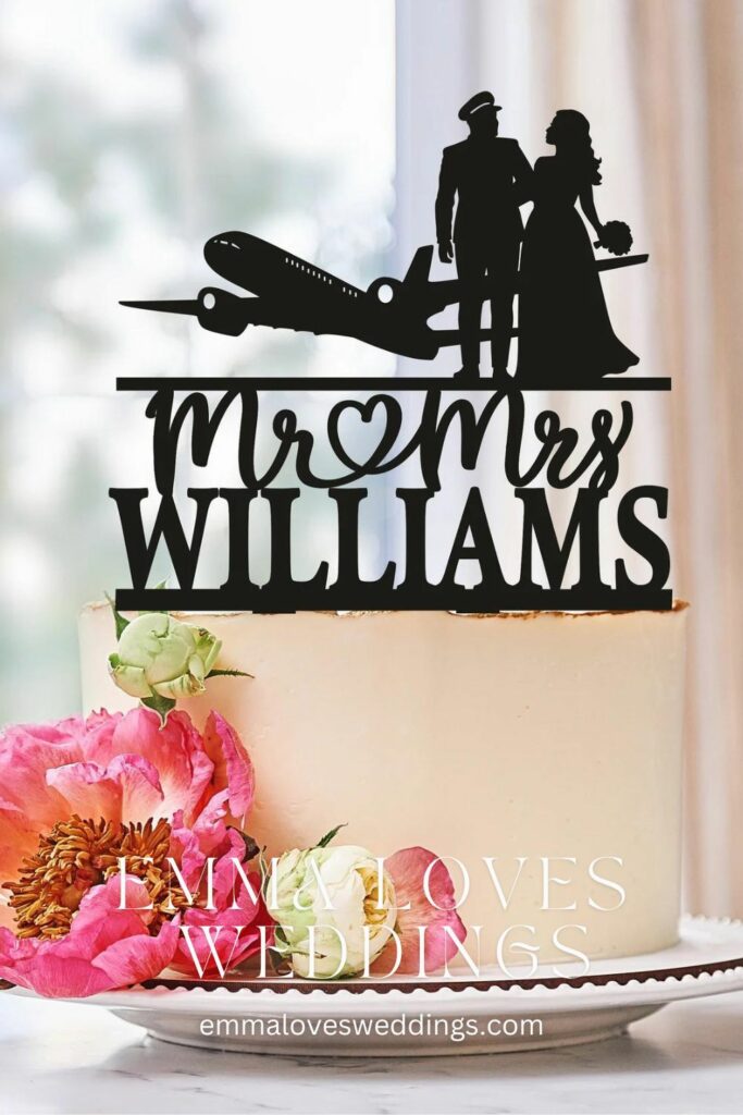 A tasty wedding cake topper with a travel theme that may be customized with any name.
