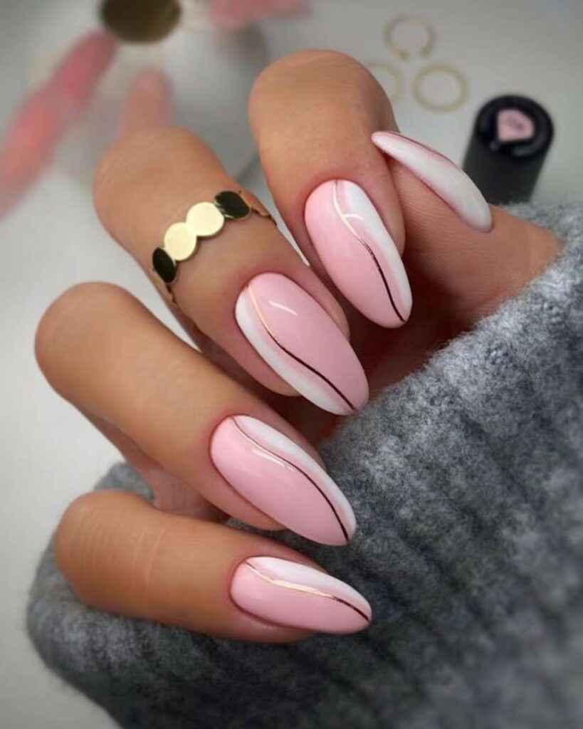 Brides can also show off their uniqueness by selecting a pink and white ombre wedding nails