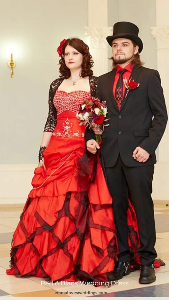 The gothic red and black wedding dress has Bridal Satin Organza and embroidered beadwork.