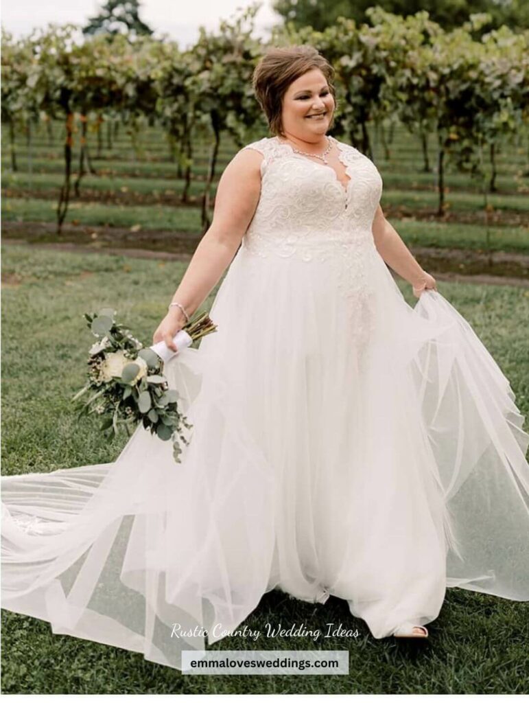 A rustic Country brides look is complete with her white bridal dress and a bouquet of eucalyptus
