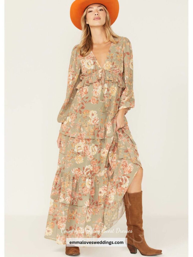 Maxi dress with elastic cuffs and a floral motif that is perfect for a country wedding guest.
