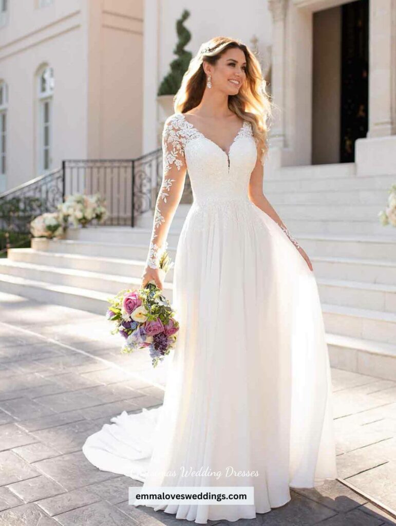 There's nothing more magical than this long sleeved chiffon wedding dress for a Christmas wedding.