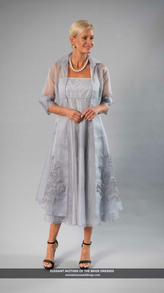 An elegant mother of the bride dress made of fine silk and dropping to a tea length