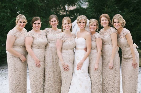 As a perfect complement to the bride these champagne lace bridesmaids dresses are a must have.