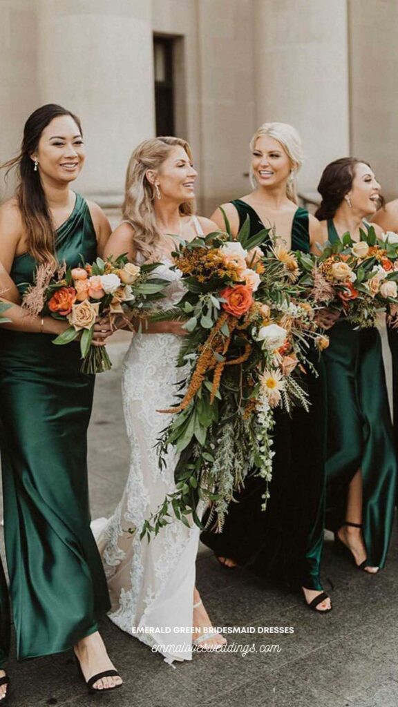 The emerald green Orange blossoms look lovely next to the bride's white and bridesmaids' dresses.