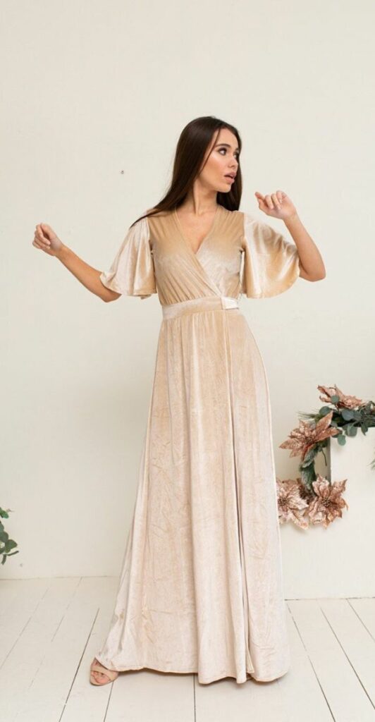 Elegant and simple champagne velvet bridesmaid dress with flutter sleeves will make you feel comfortable and relaxed throughout the ceremony.