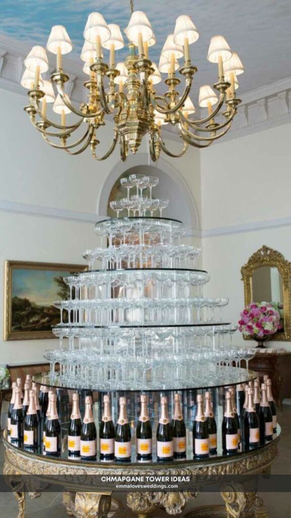 Elegant coupe glasses stand atop a champagne glass tower.