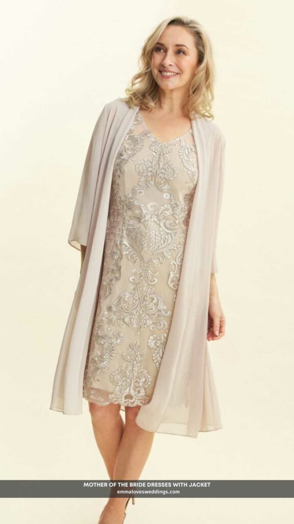 Embroidered mother of the bride dress that is short paired with an illusion jacket in Taupe color