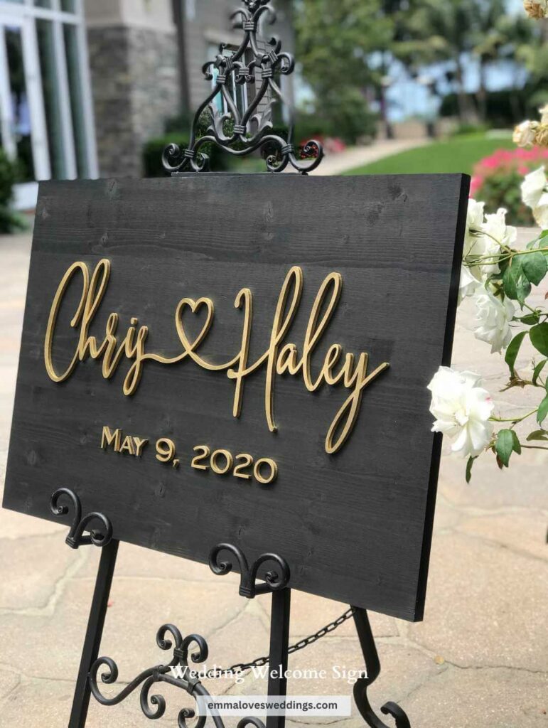 For a dramatic first impression have your guests notice this stunning black wood Wedding welcome Sign with gold letters