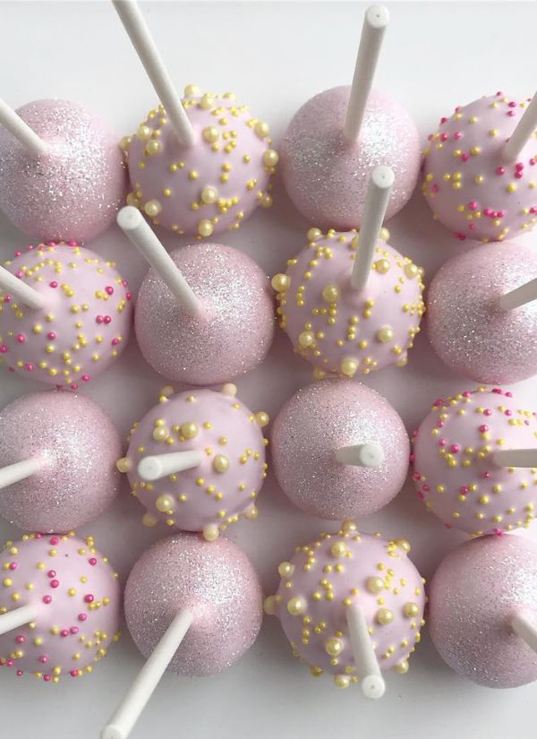 I am completely obsessed with these pink lemonade wedding cake pops.