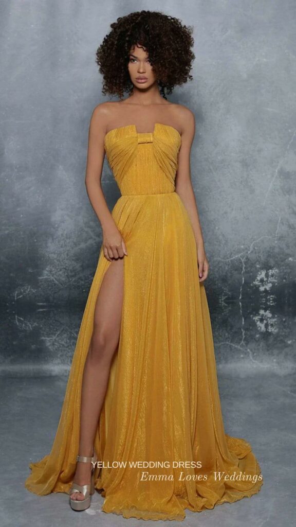 It's a daring idea to wear a yellow Strapless High Slit Silky Chiffon A-Line wedding dress with a ruched bodice and a stylish straight neckline.