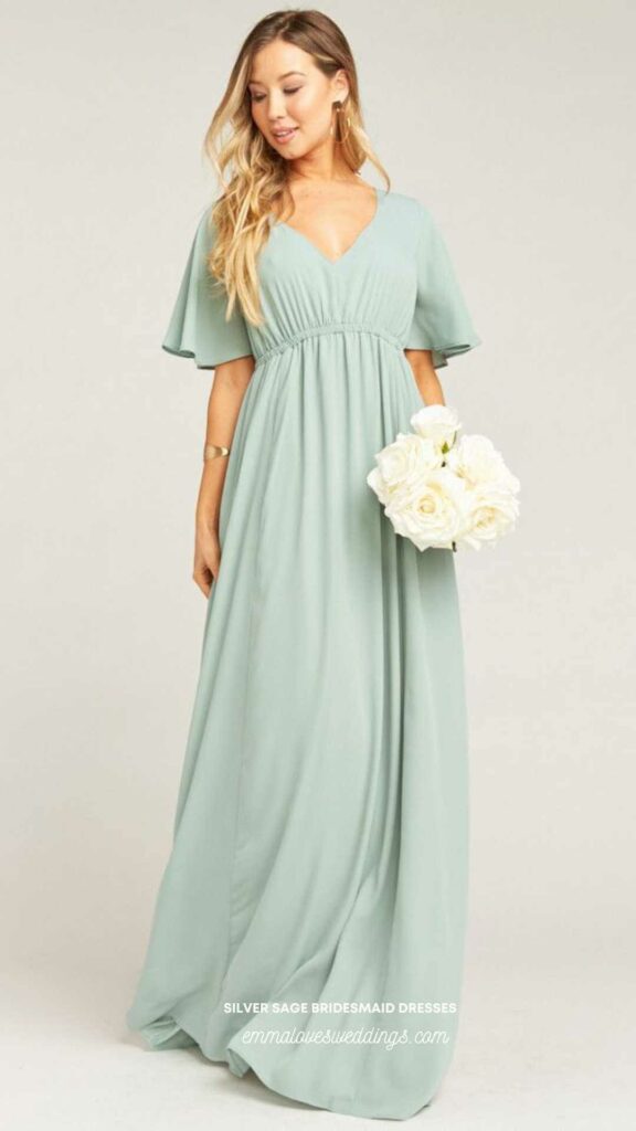Having bridesmaids wear silver sage dresses and carry white bouquets is elegant.