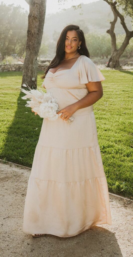 Plus size champagne bridesmaid dress with sweetheart neckline and smocked back for a flattering fit at the bust is ideal for a reason.