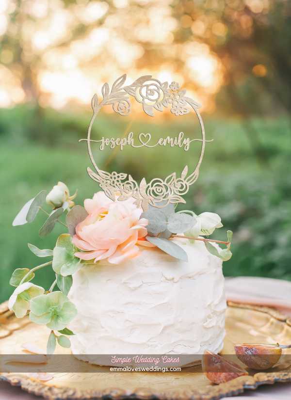Rustic cake topper on a small simple wedding cake