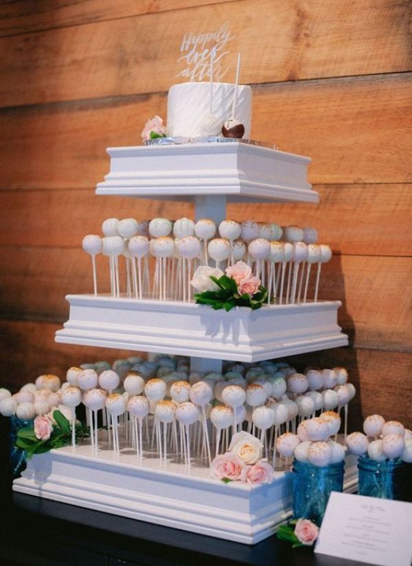 The guests at your wedding are guaranteed to go crazy about this tiered cake pop stand.