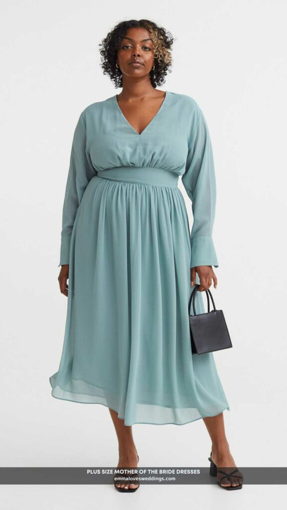 The plus size mother of the bride dress is made of breezy chiffon and has a deep v-neck and hidden back zip to keep you cool.