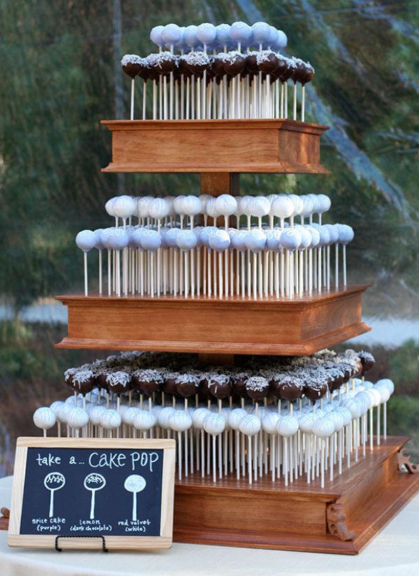 You don't want the typical wedding cake, do you? This tiered cake pop display is one of our favs