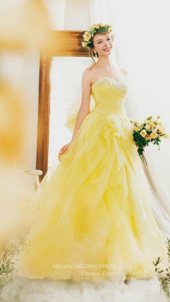 a bright lemon yellow A line wedding dress with off the shoulders for a summer or fall bride
