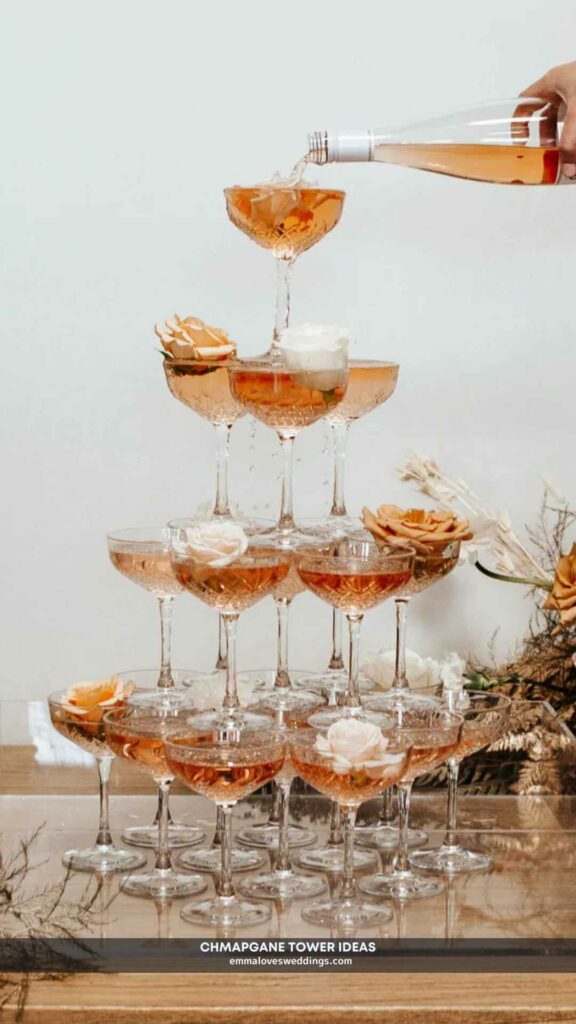 bubbling into a delectable champagne tower with lovely flowers as decoration