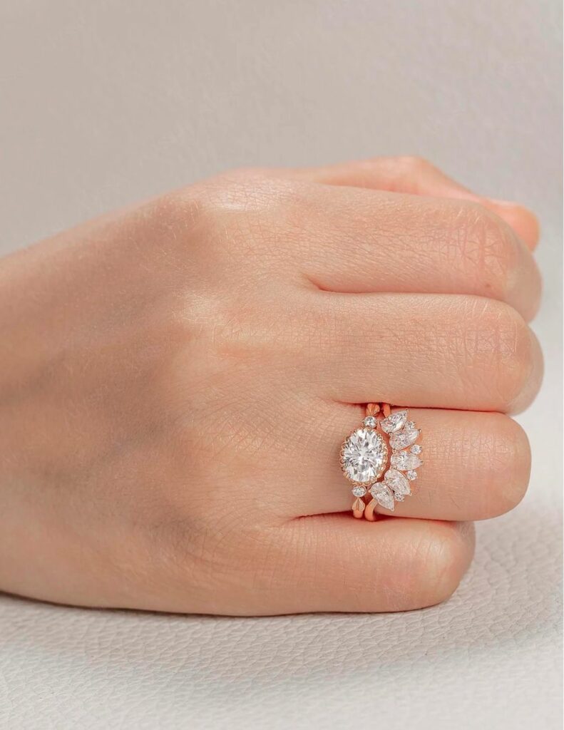 Highly portable and non sticking to any surface. You will get many compliments on this beautiful oval engagement ring with a curving wedding band.