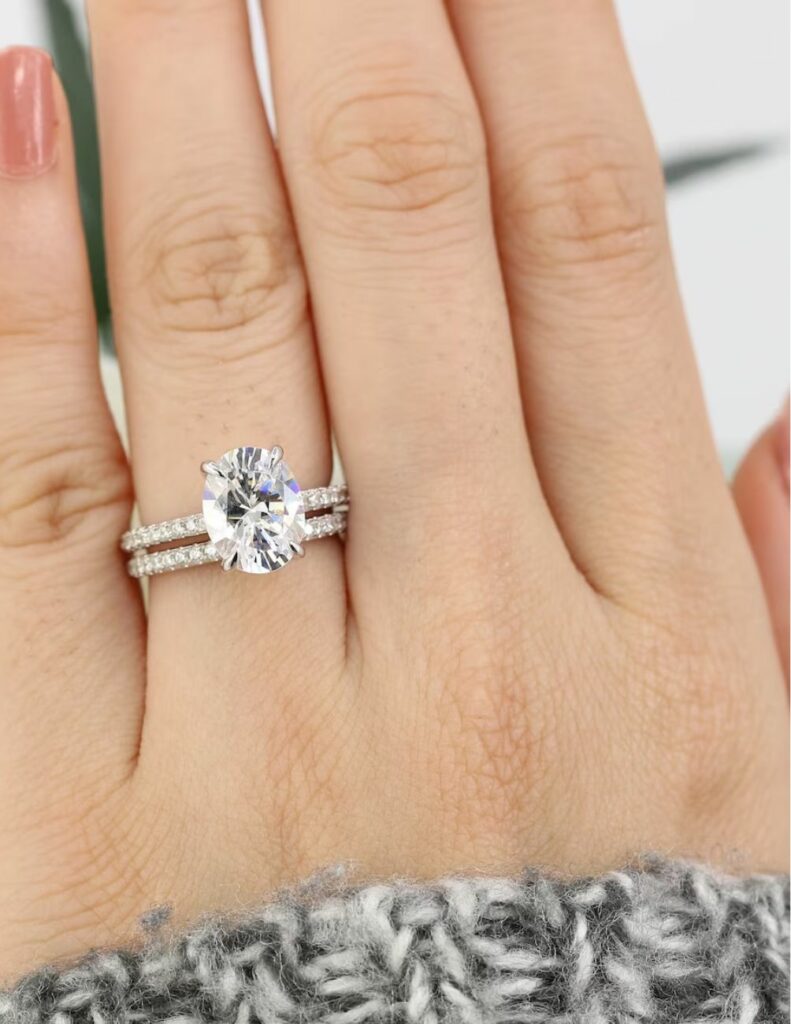 I am in awe of this stunning and classic oval solitaire ring for an engagement perfect pair with wedding band.
