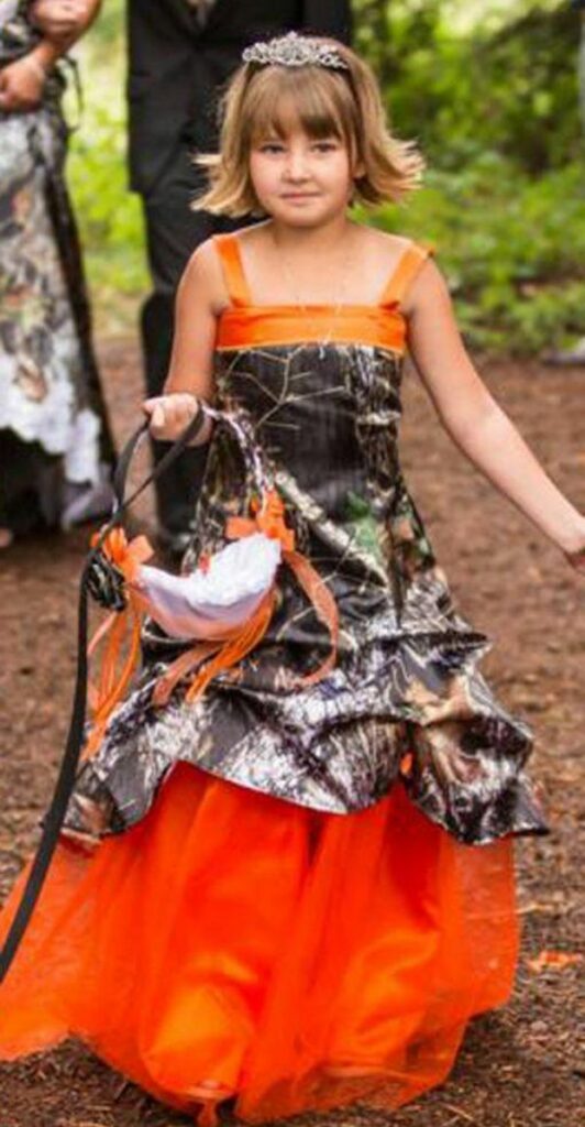 If you're having a rustic wedding an orange camo wedding for the flower girl might be a lot of fun to plan.