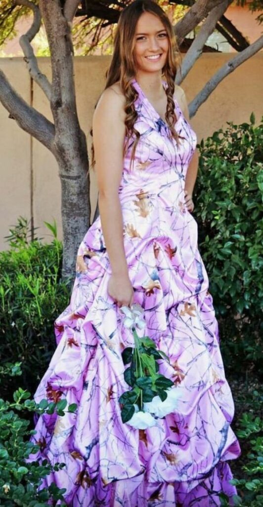 Long sleeveless and halter style this camo A line pink wedding dress is very gorgeous.