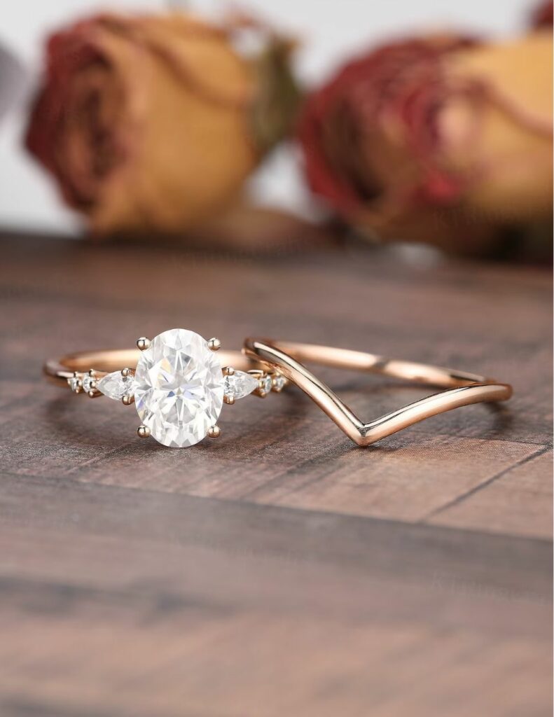 Oval moissanite engagement ring with a curved wedding band just the way you always imagined it would look on your finger on your wedding day.