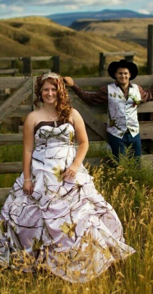 The strapless camo wedding dress for plus size brides appears like it was made for her.