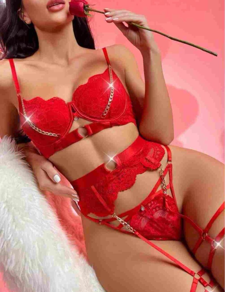 Valentine's Day lingerie set includes a bra, a garter, and a thong made of floral patterned lace with an underwire.
