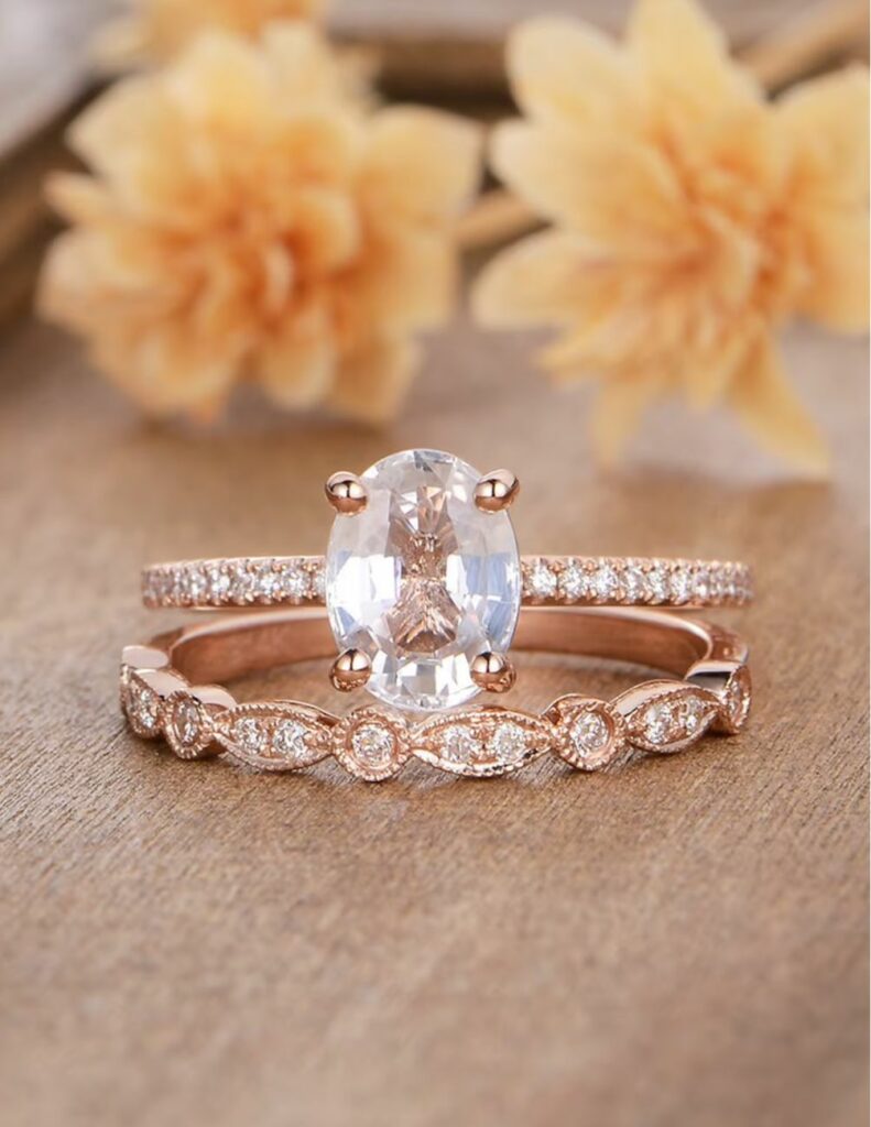 You will love this stunning art deco diamond wedding band with its oval cut engagement ring.