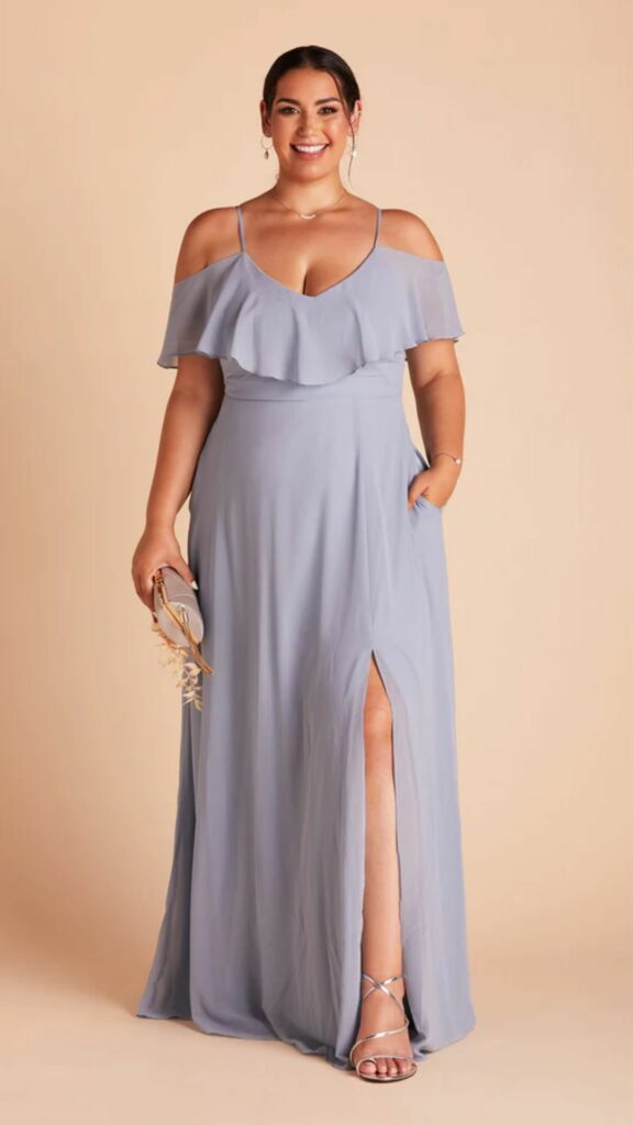 A draping sleeves chiffon dress in a dusty blue color perfect for a plus size bridesmaid.