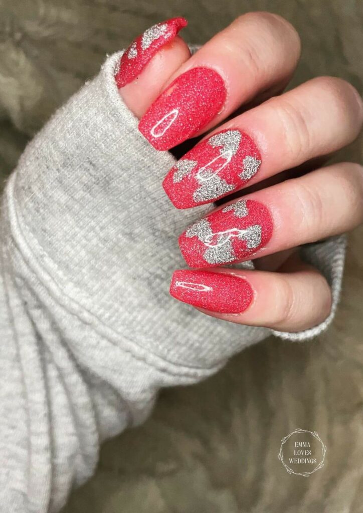 A favorite nail design is red valentines nails with a glittery silver heart.