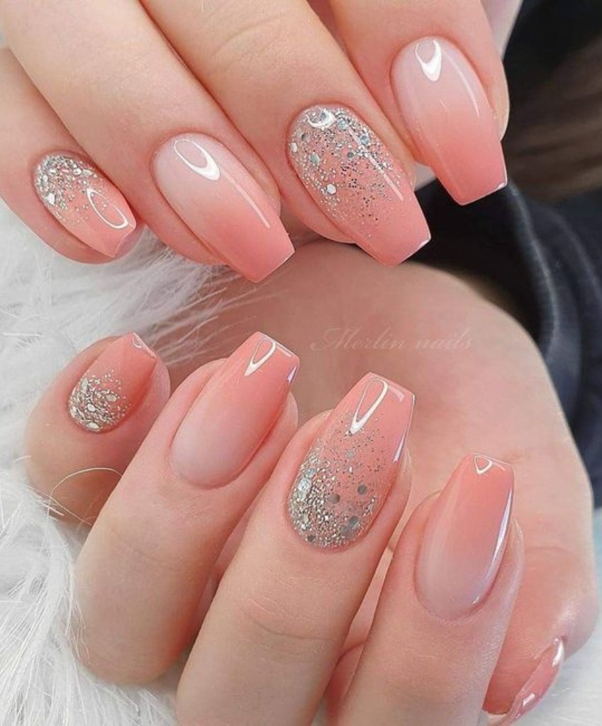 Add a touch of sparkle to your special day with these mesmerizing glitter ombre wedding nail ideas that blend the perfect amount of glitz and glam