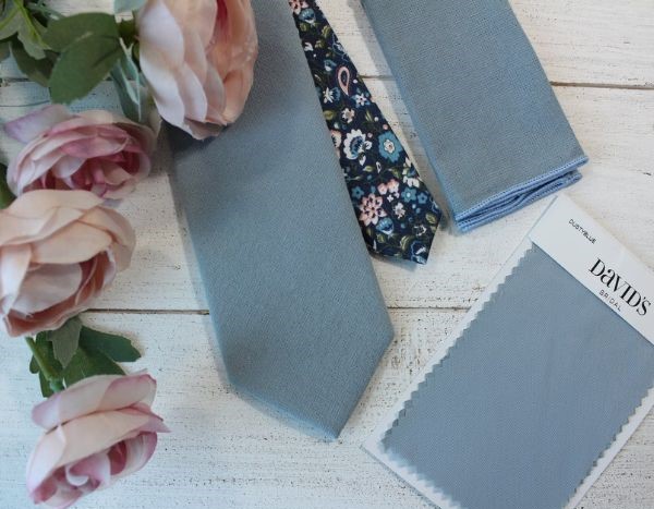 Add some flair to your outfit with this dusty blue tie
