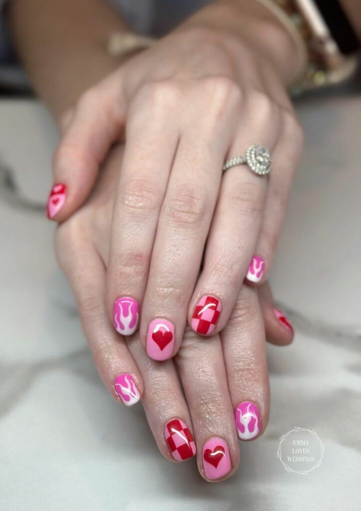 Consider this pink red color romantic theme into your valentines short nail art design