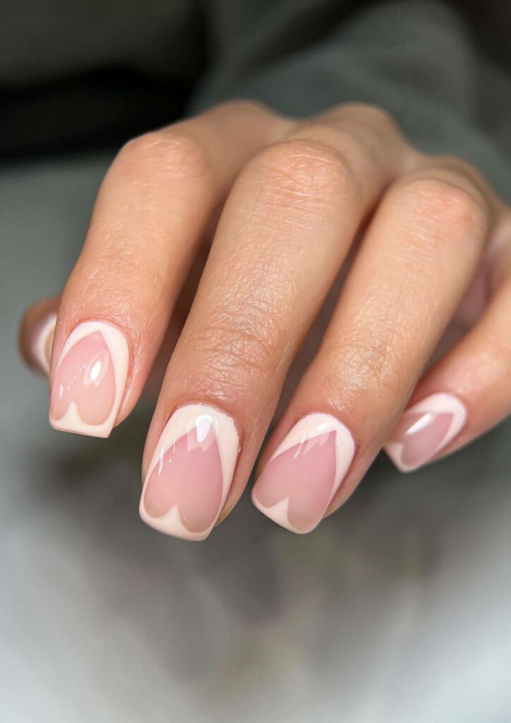 Its almost Valentine's Day so paint a heart on your nude nails.