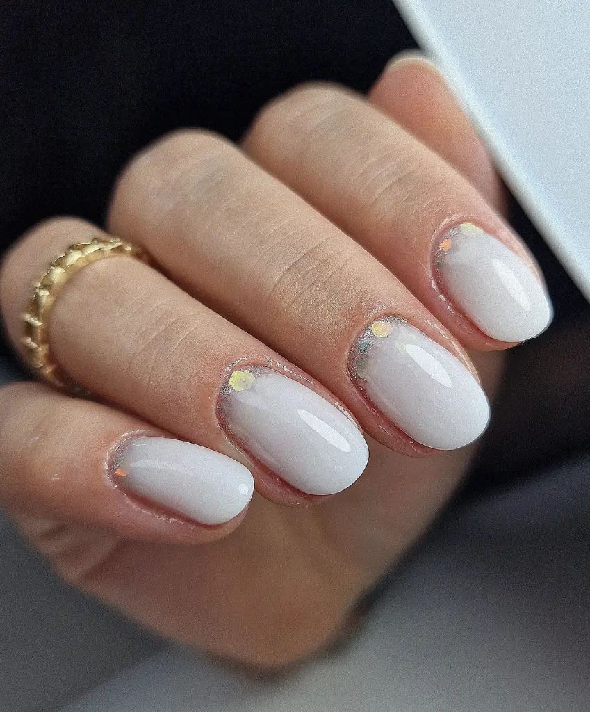 Liven up with some milky white glam ombre wedding nail ideas.