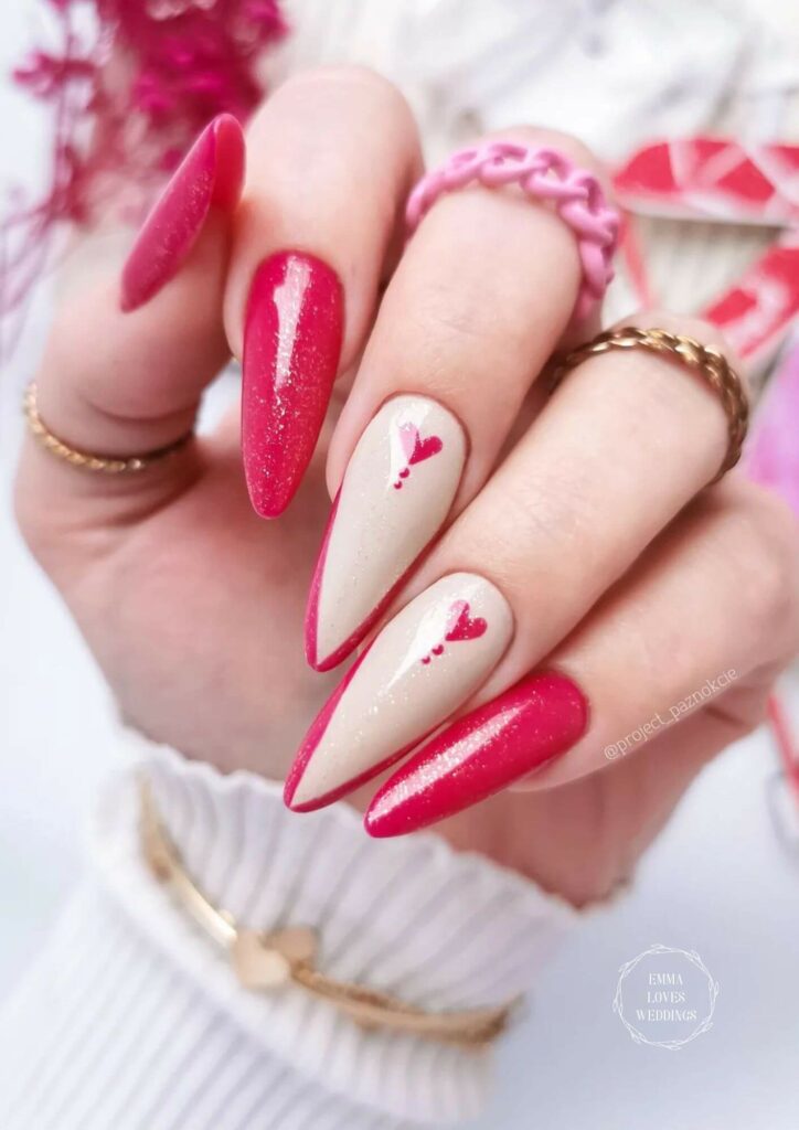 Love this Valentine's Day nail art that has a golden glow on hot pink nails.