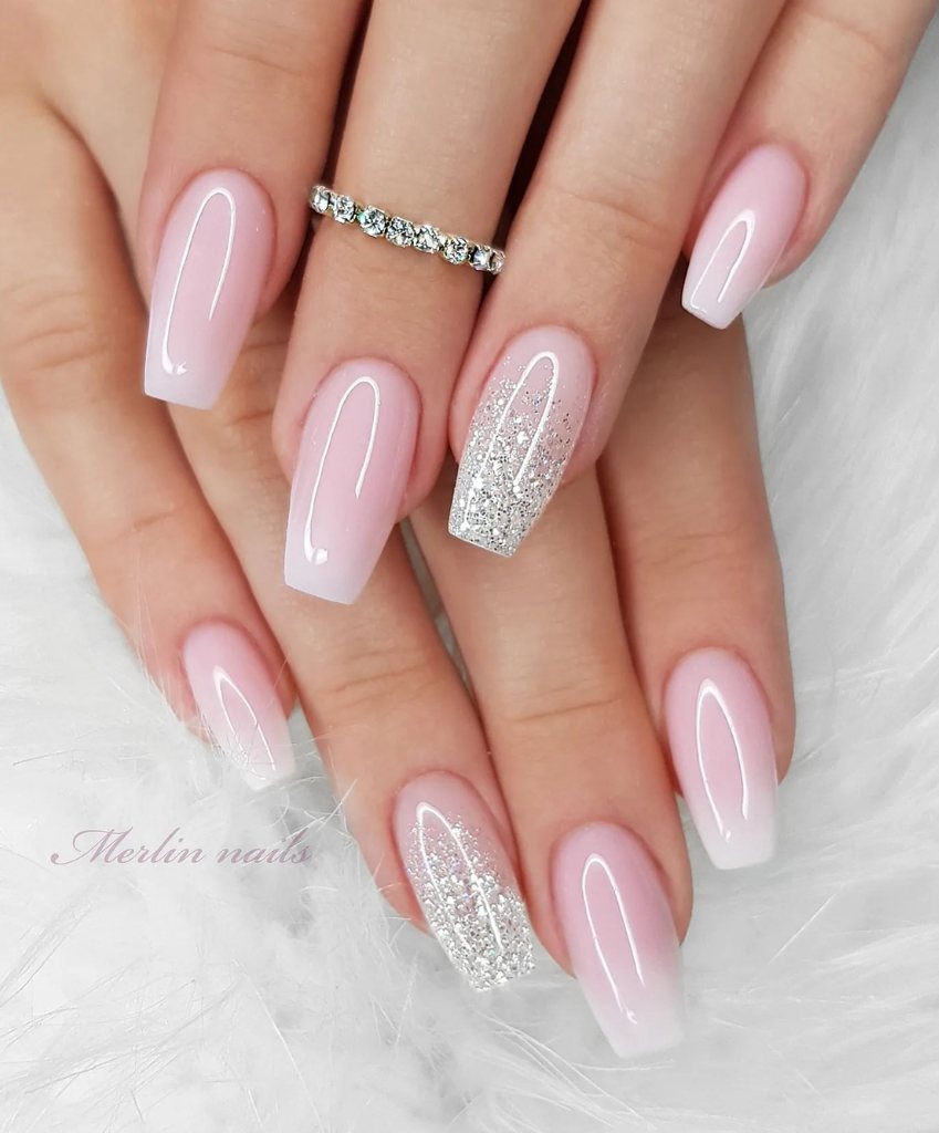 Nail designs for a wedding in pastel pink and white ombre.