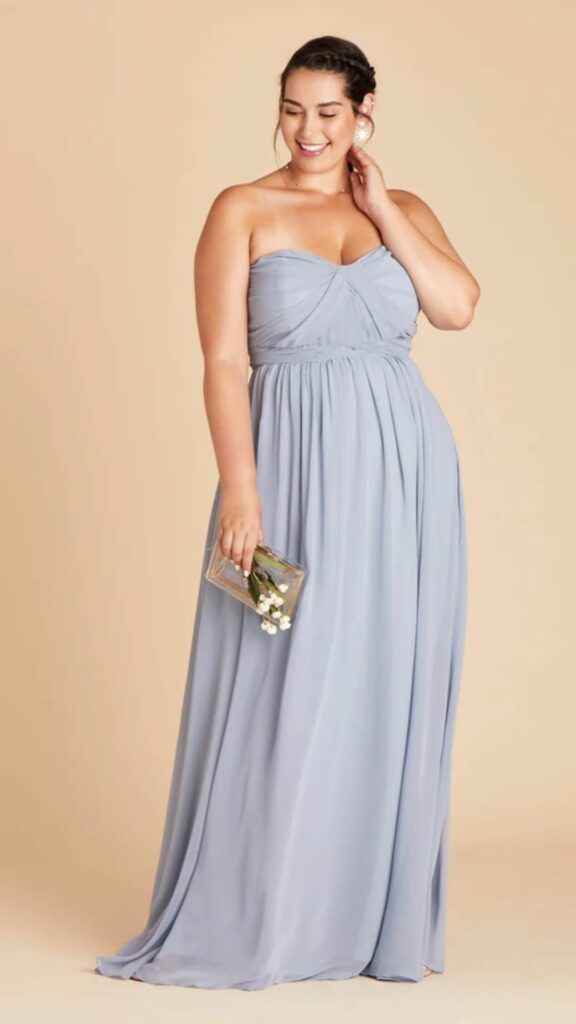 Plus size bridesmaid dress in dusty blue chiffon that flows beautifully and can be dressed in a variety of ways.