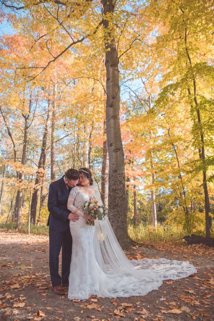 That bride and groom look really stunning in their fall wedding colors.