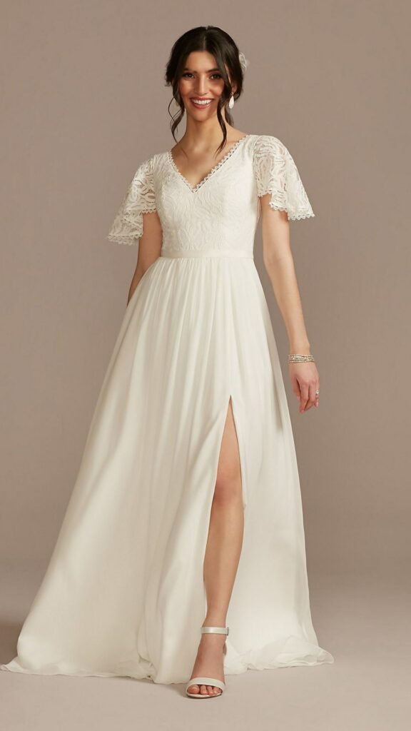 The lace and chiffon flutter sleeve A line bohemian wedding dress is a best idea for the boho bride.