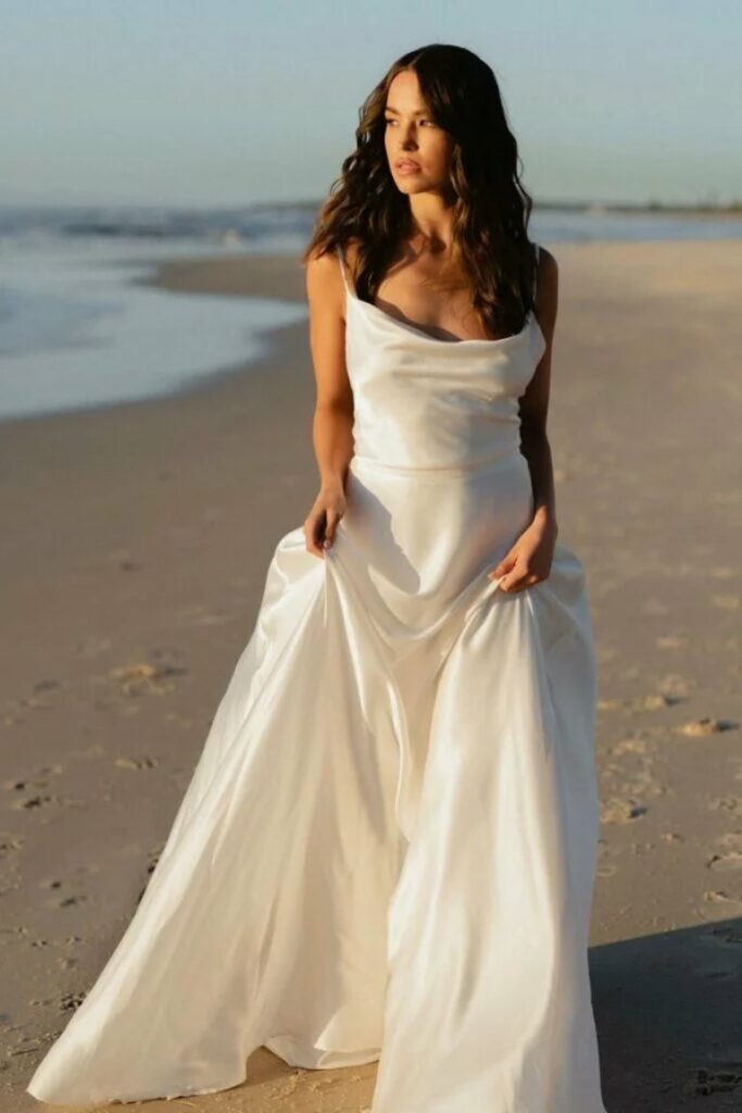 This beach wedding dress is an incredibly simple beautiful choice for making a dramatic first impression