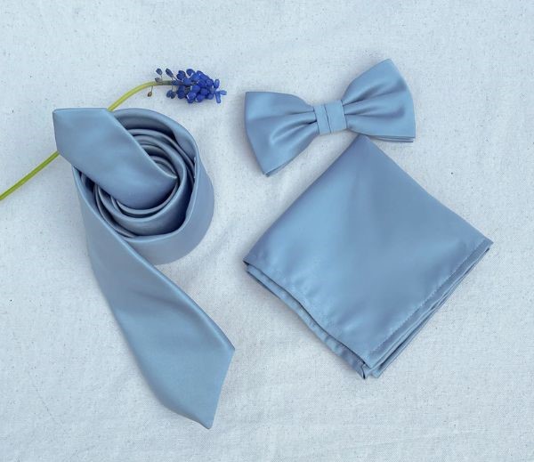 This dusty blue satin tie features a bow and wave pocket allowing your outfit to shine.