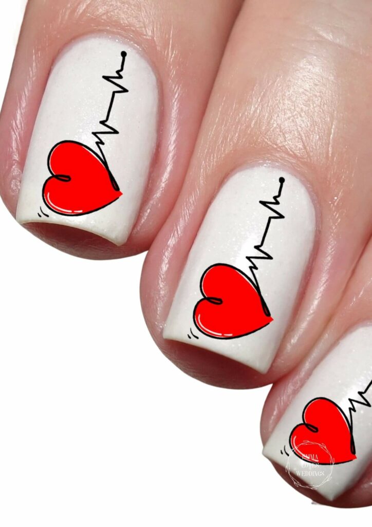 Valentines Day nail art decal stickers with heartbeats are a lovely idea.