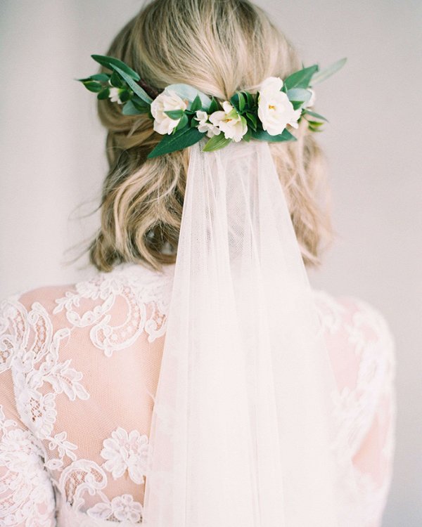 Veils aren't just for brides with long hair they can look lovely with short natural hairstyles for a more rustic wedding look.