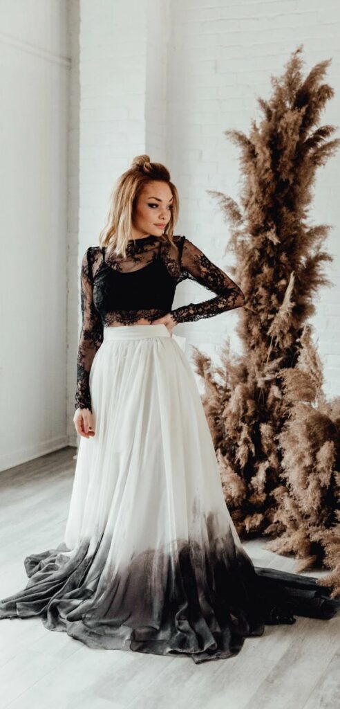 A bold gothic bride who wants to stand out on her wedding day should consider this black and white ombre dress.