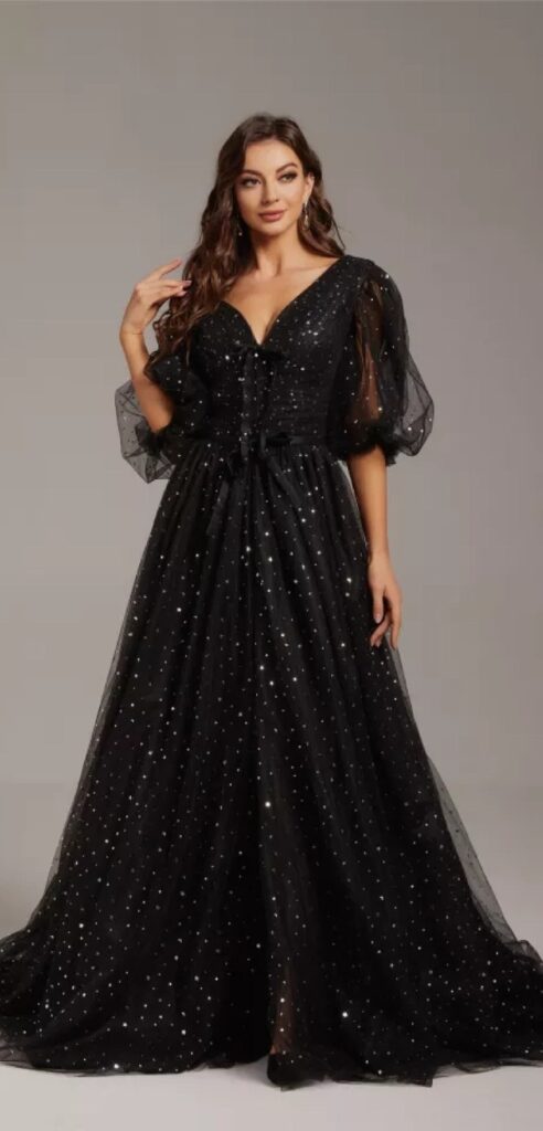 A classic masterpiece this plus size black vintage wedding dress with lovely puff sleeves exudes glitz refinement and romantic charm.