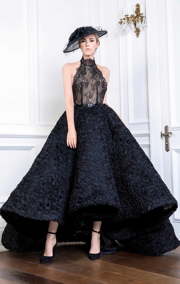 A traditional black ruffle ballgown with beautiful lace accents will make a big statement on your wedding day.